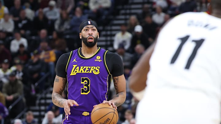 Jan 13, 2024; Salt Lake City, Utah, USA; Los Angeles Lakers forward Anthony Davis (3) looks to pass the ball against the Utah Jazz during the first quarter at Delta Center. Mandatory Credit: Rob Gray-Imagn Images