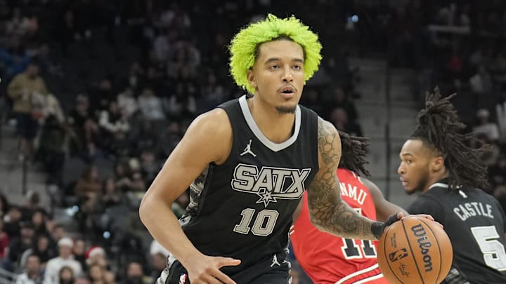 Dec 5, 2024; San Antonio, Texas, USA; San Antonio Spurs forward Jeremy Sochan (10) looks to pass the ball during the second half against the Chicago Bulls at Frost Bank Center. Mandatory Credit: Scott Wachter-Imagn Images
