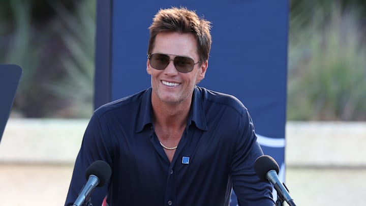 Retired New England Patriot Hall of Famer Tom Brady speaks during a statue unveiling