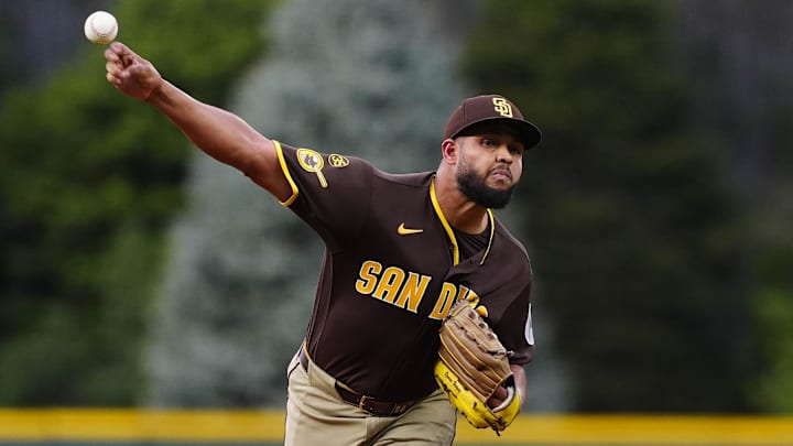 Apr 21, 2026; Denver, Colorado, USA; San Diego Padres starting pitcher Randy Vasquez (98) delivers a pitch in the first inning against the Colorado Rockies at Coors Field. Mandatory Credit: Ron Chenoy-Imagn Images