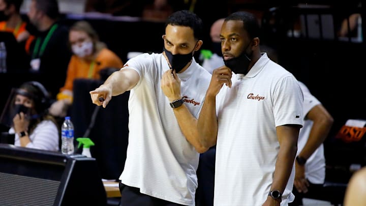 OSU coach Mike Boynton, right, talks with assistant Erik Pastrana last season. Pastrana joined Florida's staff last summer.

Syndication The Oklahoman