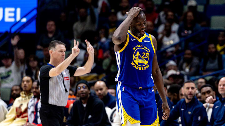 Mar 28, 2025; New Orleans, Louisiana, USA;  Golden State Warriors forward Draymond Green (23) reacts to having his sixth foul against the New Orleans Pelicans during the second half at Smoothie King Center. Mandatory Credit: Stephen Lew-Imagn Images