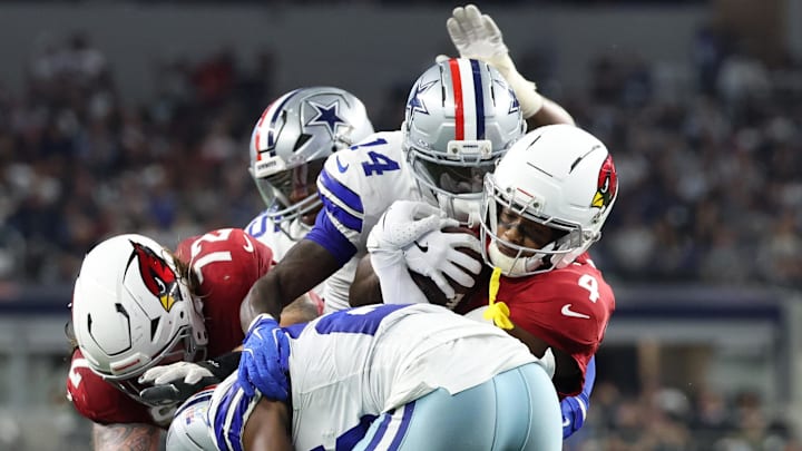 Arizona Cardinals wide receiver Greg Dortch runs against Dallas Cowboys safety Markquese Bell.