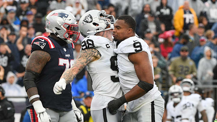 Sep 7, 2025; Foxborough, Massachusetts, USA; Las Vegas Raiders defensive end Tyree Wilson (9) reacts with  defensive end Maxx Crosby (98) during the second half at Gillette Stadium. Mandatory Credit: Bob DeChiara-Imagn Images
