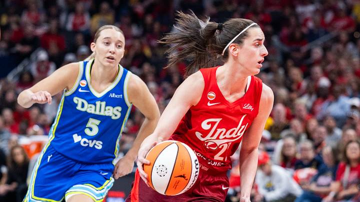 May 9, 2026; Indianapolis, Indiana, USA; Indiana Fever guard Caitlin Clark (22) dribbles the ball while Dallas Wings guard Paige Bueckers (5) defends in the first half at Gainbridge Fieldhouse. Mandatory Credit: Trevor Ruszkowski-Imagn Images May 9, 2026; Indianapolis, Indiana, USA; Indiana Fever guard Caitlin Clark (22) dribbles the ball while Dallas Wings guard Paige Bueckers (5) defends in the first half at Gainbridge Fieldhouse. Mandatory Credit: Trevor Ruszkowski-Imagn Images