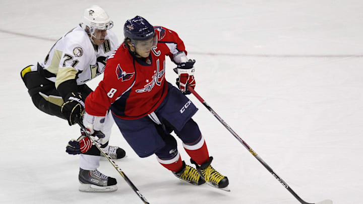 December 23, 2010; Washington, DC, USA; Washington Capitals left wing Alex Ovechkin (8) skates with the puck against Pittsburgh Penguins center Evgeni Malkin (71) in the first period at Verizon Center. Mandatory Credit: Geoff Burke-Imagn Images