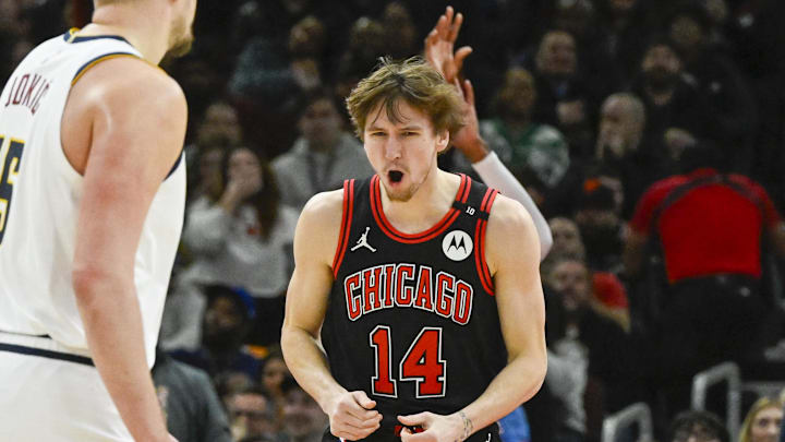 Jan 27, 2025; Chicago, Illinois, USA; Chicago Bulls forward Matas Buzelis (14) reacts after a dunk against the Denver Nuggets during the second half at the United Center. Mandatory Credit: Matt Marton-Imagn Images