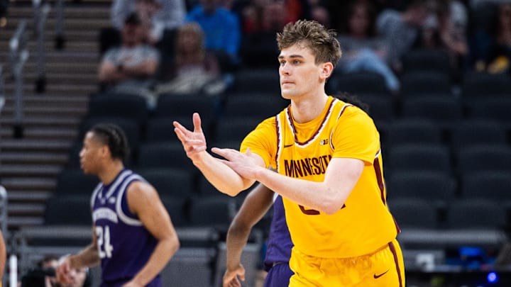 Mar 12, 2025; Indianapolis, IN, USA;  Minnesota Golden Gophers guard Brennan Rigsby (24) celebrates a made basket in the first half against the Northwestern Wildcats at Gainbridge Fieldhouse. Mandatory Credit: Trevor Ruszkowski-Imagn Images
