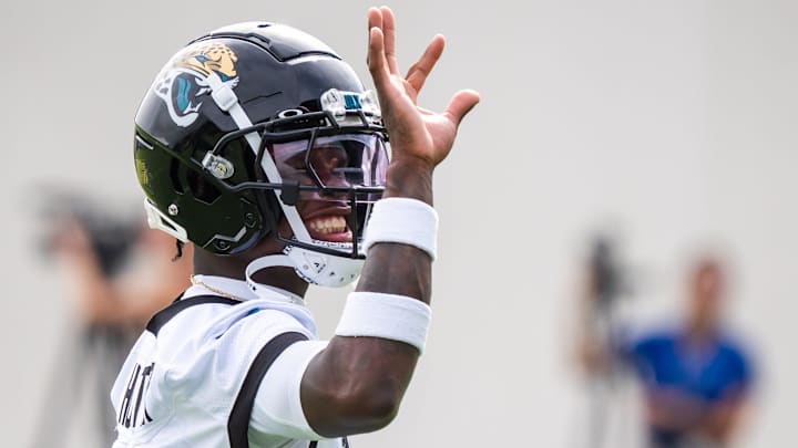 Jacksonville Jaguars wide receiver Travis Hunter (12) waves to someone in the stands during the Jacksonville Jaguars’ mandatory minicamp Tuesday June 10, 2025 at the Miller Electric Center in Jacksonville, Fla. [Doug Engle/Florida Times-Union]