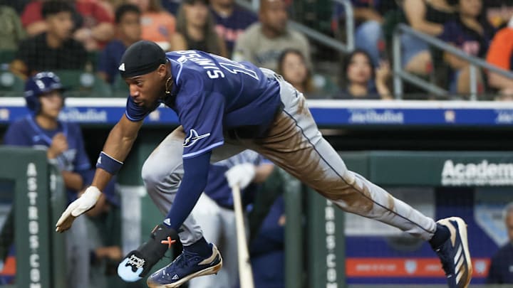 Tampa Bay Rays left fielder Chandler Simpson (14) steals third base then scores a run on Houston Astros catcher Yainer Diaz (21) (not pictured) errant throw in the fourth inning at Daikin Park on May 29. Tampa Bay Rays left fielder Chandler Simpson (14) steals third base then scores a run on Houston Astros catcher Yainer Diaz (21) (not pictured) errant throw in the fourth inning at Daikin Park on May 29.