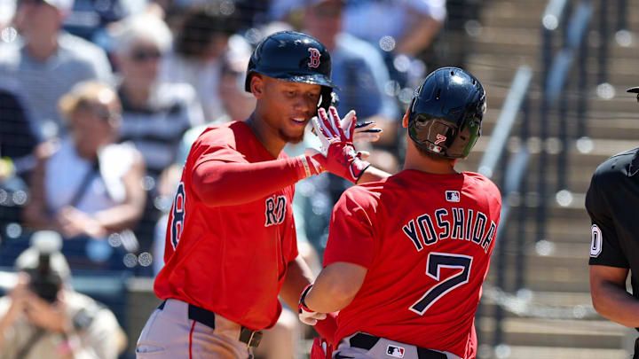 Mar 18, 2025; Tampa, Florida, USA; Boston Red Sox outfielder Masataka Yoshida (7) celebrates with second baseman Kristian Campbell (28) after hitting a two run home run against the New York Yankees in the sixth inning during spring training at George M. Steinbrenner Field. Mandatory Credit: Nathan Ray Seebeck-Imagn Images