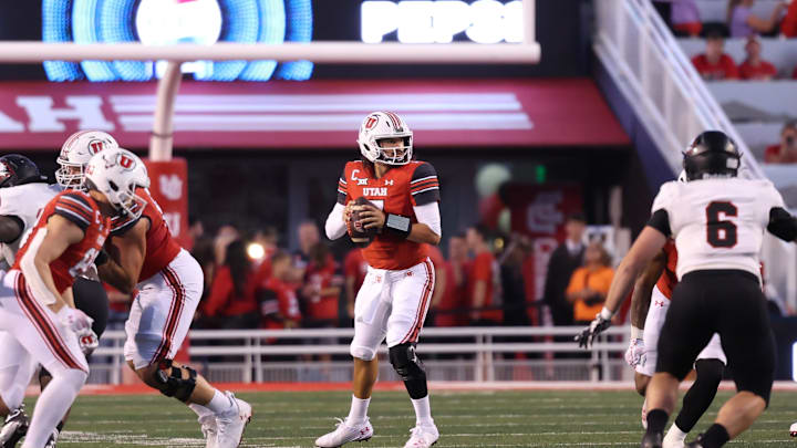 Aug 29, 2024; Salt Lake City, Utah, USA; Utah Utes quarterback Cameron Rising (7) drops back to pass against the Southern Utah Thunderbirds during the second quarter at Rice-Eccles Stadium. Mandatory Credit: Rob Gray-Imagn Images
