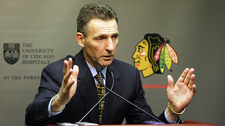 Chicago Blackhawks former head coach Denis Savard talks with the media after his team defeated the Dallas Stars 2-1 at the United Center in Chicago, IL.  Mandatory Credit: Jerry Lai-USA TODAY Sports Copyright © 2006 Jerry Lai
