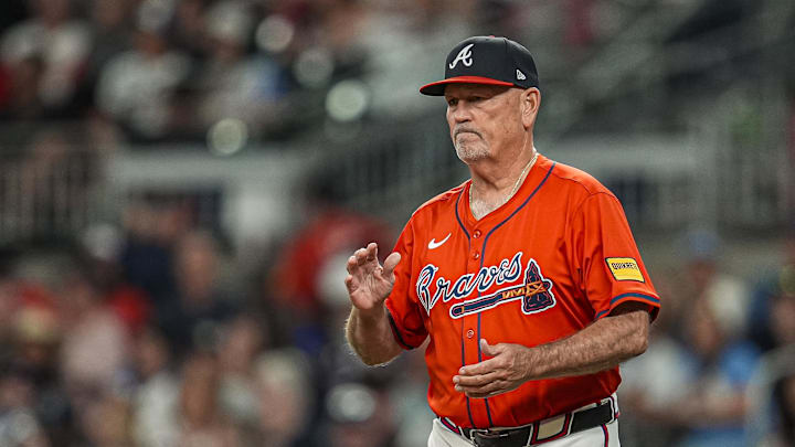 May 30, 2025; Cumberland, Georgia, USA; Atlanta Braves manager Brian Snitker (43) walks on the field to change pitchers against the Boston Red Sox during the seventh inning at Truist Park. Mandatory Credit: Dale Zanine-Imagn Images