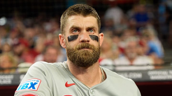 Sep 19, 2025; Phoenix, Arizona, USA;  Philadelphia Phillies infielder Bryce Harper (3) watches on from the dugout before his first at bat of the game against the Arizona Diamondbacks at Chase Field. Mandatory Credit: Allan Henry-Imagn Images