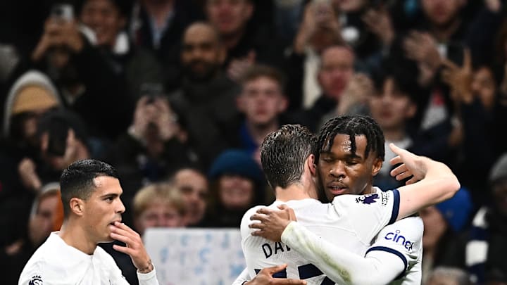 Destiny Udogie and Ben Davies embrace in the win over Newcastle United last season
