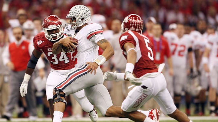 (NCL_OSU_11_SUGAR_LAURON 04JAN11) Ohio State Buckeyes quarterback Terrelle Pryor (2) slips around the Arkansas Razorbacks defense during first half of the Sugar Bowl at the Louisiana Superdome in New Orleans, January 4, 2011. (Dispatch photo by Neal C. Lauron)
Ncl Osu 11 Sugar 0025 (NCL_OSU_11_SUGAR_LAURON 04JAN11) Ohio State Buckeyes quarterback Terrelle Pryor (2) slips around the Arkansas Razorbacks defense during first half of the Sugar Bowl at the Louisiana Superdome in New Orleans, January 4, 2011. (Dispatch photo by Neal C. Lauron)
Ncl Osu 11 Sugar 0025