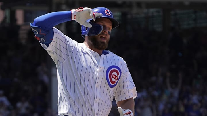 Jun 21, 2025; Chicago, Illinois, USA; Chicago Cubs first base Michael Busch (29) gestures after hitting a three-run home run against the Seattle Mariners during the third inning at Wrigley Field. 