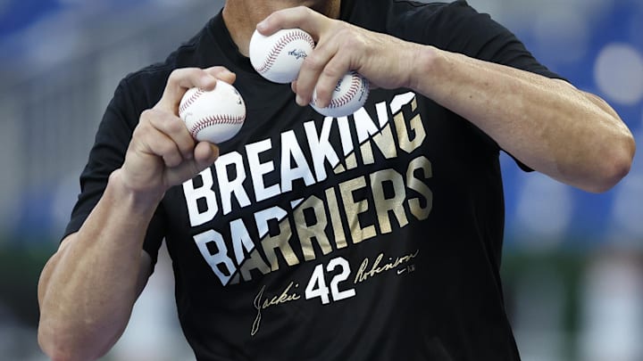 Apr 15, 2024; Miami, Florida, USA; Miami Marlins and San Francisco Giants players and coaches wear number 42 on jerseys and t-shirts to honor Jackie Robinson Day at loanDepot Park. Apr 15, 2024; Miami, Florida, USA; Miami Marlins and San Francisco Giants players and coaches wear number 42 on jerseys and t-shirts to honor Jackie Robinson Day at loanDepot Park.