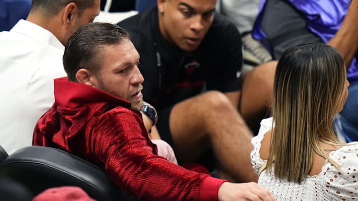 Jun 9, 2023; Miami, Florida, USA; Irish mixed martial artist Conor McGregor looks on during the first half in game four of the 2023 NBA Finals between the Miami Heat and the Denver Nuggets at Kaseya Center. Mandatory Credit: Rich Storry-Imagn Images