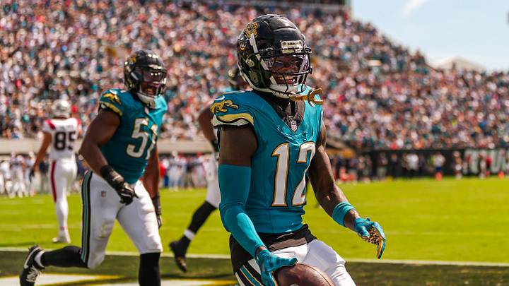 Jacksonville Jaguars wide receiver/cornerback Travis Hunter (12) celebrates his interception in the second quarter during an NFL football game at EverBank Stadium, Sunday, September 27, 2026, in Jacksonville, Fla. [Doug Engle/Florida Times-Union]