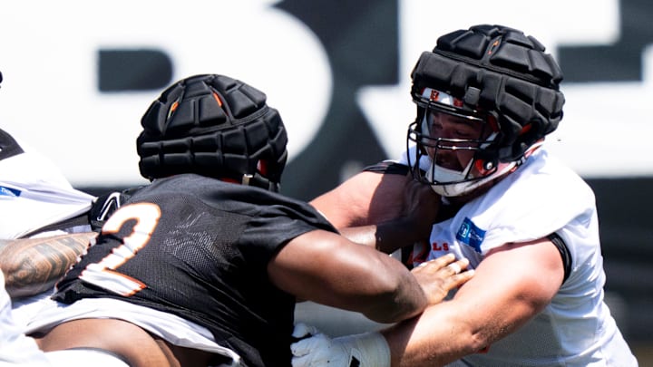 Cincinnati Bengals center Ben Brown (62) and Cincinnati Bengals defensive tackle Domenique Davis