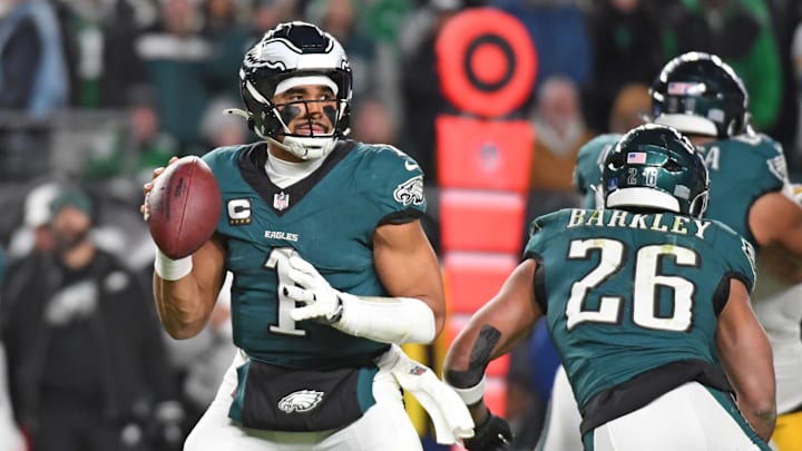 Dec 15, 2024; Philadelphia, Pennsylvania, USA; Philadelphia Eagles quarterback Jalen Hurts (1) looks for reciever against the Pittsburgh Steelers during the fourth quarter at Lincoln Financial Field. Mandatory Credit: Eric Hartline-Imagn Images Dec 15, 2024; Philadelphia, Pennsylvania, USA; Philadelphia Eagles quarterback Jalen Hurts (1) looks for reciever against the Pittsburgh Steelers during the fourth quarter at Lincoln Financial Field. Mandatory Credit: Eric Hartline-Imagn Images