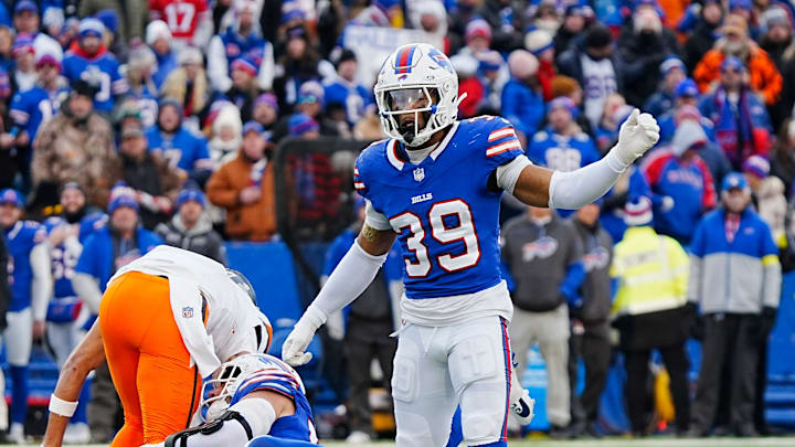 Buffalo Bills linebacker Matt Milano and Buffalo Bills cornerback Cam Lewis break up.a pass during the second half of the Buffalo Bills wild card game against the Denver Broncos at Highmark Stadium in Orchard Park on Jan. 12, 2025.