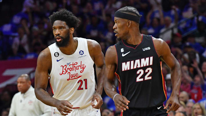 Apr 6, 2023; Philadelphia, Pennsylvania, USA; Philadelphia 76ers center Joel Embiid (21) and Miami Heat forward Jimmy Butler (22) during the first quarter at Wells Fargo Center. Mandatory Credit: Eric Hartline-Imagn Images