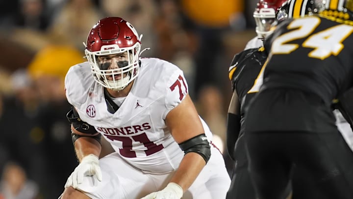 Nov 9, 2024; Columbia, Missouri, USA; Oklahoma Sooners offensive lineman Logan Howland (71) gets ready to block against the Missouri Tigers during the first half at Faurot Field at Memorial Stadium. Mandatory Credit: Jay Biggerstaff-Imagn Images