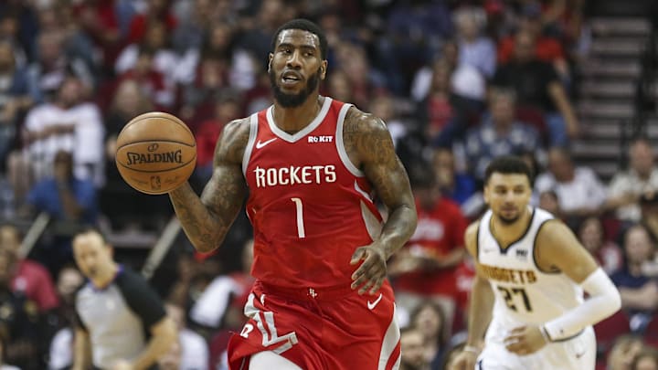 Mar 28, 2019; Houston, TX, USA; Houston Rockets guard Iman Shumpert (1) dribbles the ball during the second quarter against the Denver Nuggets at Toyota Center. Mandatory Credit: Troy Taormina-Imagn Images