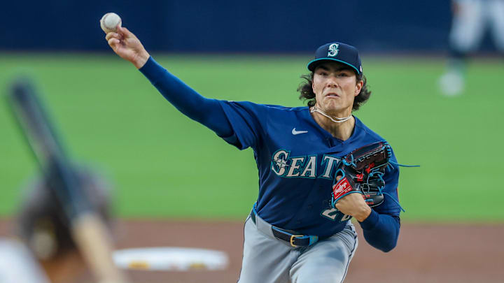 Bryan Woo (22) throws a pitch during the first inning against the San Diego Padres at Petco Park. Bryan Woo (22) throws a pitch during the first inning against the San Diego Padres at Petco Park.
