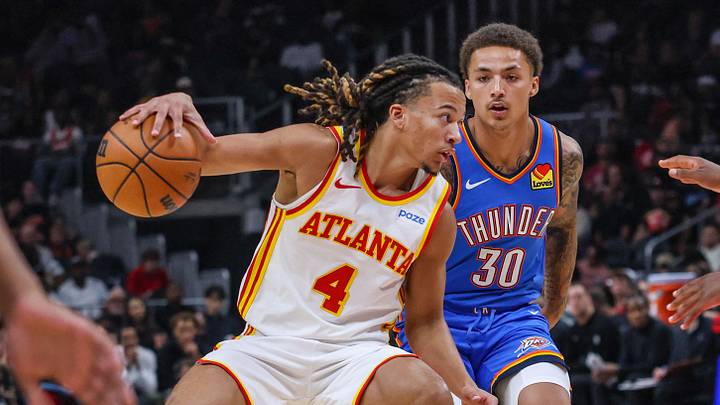 Oct 12, 2026; Atlanta, Georgia, USA; Atlanta Hawks guard Kingston Flemings (4) dribbles against Oklahoma City Thunder guard Anthony Pritchard (30) during the first quarter at State Farm Arena. Mandatory Credit: Jordan Godfree-Imagn Images Oct 12, 2026; Atlanta, Georgia, USA; Atlanta Hawks guard Kingston Flemings (4) dribbles against Oklahoma City Thunder guard Anthony Pritchard (30) during the first quarter at State Farm Arena. Mandatory Credit: Jordan Godfree-Imagn Images