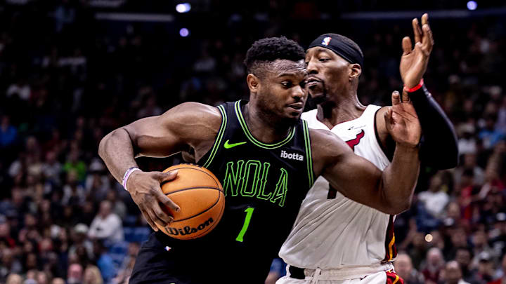 Feb 23, 2024; New Orleans, Louisiana, USA; New Orleans Pelicans forward Zion Williamson (1) drives to the basket against Miami Heat center Bam Adebayo (13) during the second half at Smoothie King Center. Feb 23, 2024; New Orleans, Louisiana, USA; New Orleans Pelicans forward Zion Williamson (1) drives to the basket against Miami Heat center Bam Adebayo (13) during the second half at Smoothie King Center.