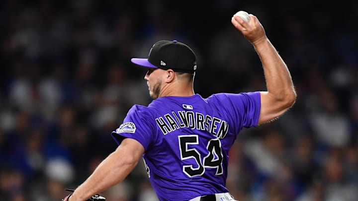 May 27, 2025; Chicago, Illinois, USA; Colorado Rockies pitcher Seth Halvorsen (54) pitches during the eighth inning against the Chicago Cubs at Wrigley Field. Mandatory Credit: Patrick Gorski-Imagn Images