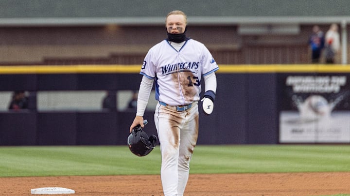Whitecaps center fielder Max Clark walks toward the dugout on Friday, April, 4, at LMCU Ballpark.