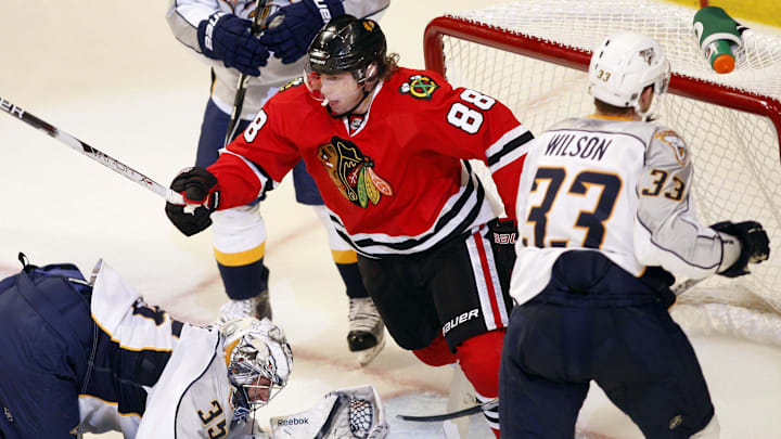 Apr 16, 2010; Chicago, IL, USA; Chicago Blackhawks right wing Patrick Kane (88) celebrates after scoring a goal past Nashville Predators goalie Pekka Rinne (35) during the second period of game one in the first round of the 2010 Stanley Cup Playoffs at the United Center. Mandatory Credit: Jerry Lai-Imagn Images