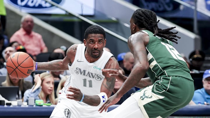Dallas Mavericks guard Kyrie Irving drives to the basket as Milwaukee Bucks forward Taurean Prince. Dallas Mavericks guard Kyrie Irving drives to the basket as Milwaukee Bucks forward Taurean Prince.