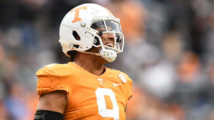 Tennessee defensive lineman/linebacker Tyler Baron (9) smiles after tackling Missouri quarterback