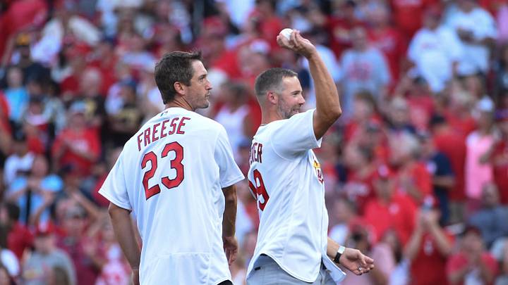 Sep 18, 2021; St. Louis, Missouri, USA; Former St. Louis Cardinals third baseman David Freese and Former St. Louis Cardinals starting pitches Chris Carpenter throw out a first pitch in a pre-game ceremony celebrating their 10 year anniversary of winning the 2011 World Series prior to a game between the St. Louis Cardinals and the San Diego Padres at Busch Stadium. Mandatory Credit: Joe Puetz-Imagn Images Sep 18, 2021; St. Louis, Missouri, USA; Former St. Louis Cardinals third baseman David Freese and Former St. Louis Cardinals starting pitches Chris Carpenter throw out a first pitch in a pre-game ceremony celebrating their 10 year anniversary of winning the 2011 World Series prior to a game between the St. Louis Cardinals and the San Diego Padres at Busch Stadium. Mandatory Credit: Joe Puetz-Imagn Images