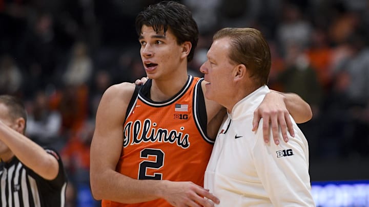 Dec 6, 2025; Nashville, Tennessee, USA; Illinois Fighting Illini guard Andrej Stojakovic (2) celebrates the win with head coach Brad Underwood against the Tennessee Volunteers during the second half at Bridgestone Arena. Mandatory Credit: Steve Roberts-Imagn Images Dec 6, 2025; Nashville, Tennessee, USA; Illinois Fighting Illini guard Andrej Stojakovic (2) celebrates the win with head coach Brad Underwood against the Tennessee Volunteers during the second half at Bridgestone Arena. Mandatory Credit: Steve Roberts-Imagn Images