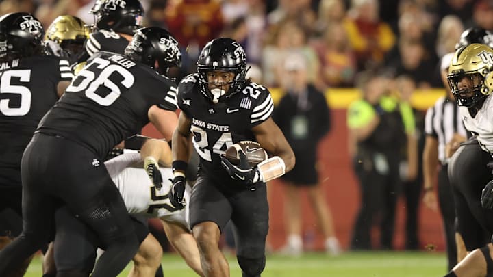 Oct 19, 2024; Ames, Iowa, USA; Iowa State Cyclones running back Abu Sama III (24) runs the football against the UCF Knights at Jack Trice Stadium. The Cyclones beat the Knights 38 to 35.  Mandatory Credit: Reese Strickland-Imagn Images