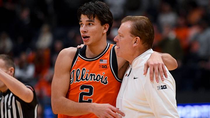 Dec 6, 2025; Nashville, Tennessee, USA; Illinois Fighting Illini guard Andrej Stojakovic (2) celebrates the win with head coach Brad Underwood against the Tennessee Volunteers during the second half at Bridgestone Arena. Mandatory Credit: Steve Roberts-Imagn Images Dec 6, 2025; Nashville, Tennessee, USA; Illinois Fighting Illini guard Andrej Stojakovic (2) celebrates the win with head coach Brad Underwood against the Tennessee Volunteers during the second half at Bridgestone Arena. Mandatory Credit: Steve Roberts-Imagn Images