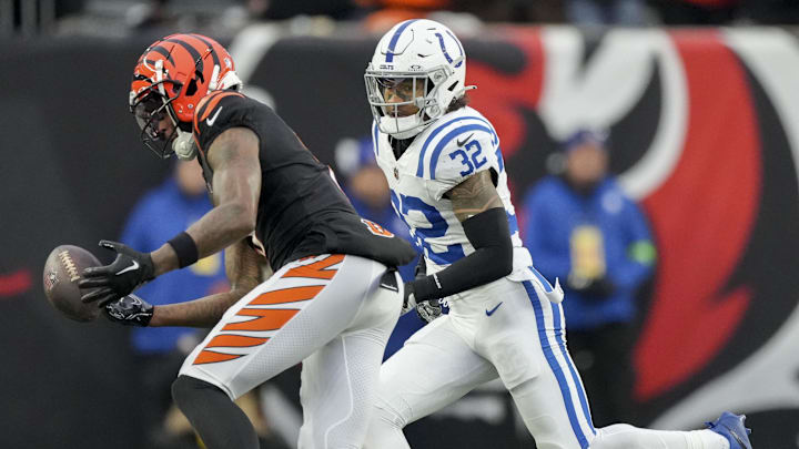 Dec 10, 2023; Cincinnati, Ohio, USA; A pass intended for Cincinnati Bengals wide receiver Tee Higgins (5) goes incomplete as Indianapolis Colts safety Julian Blackmon (32) gives chase at Paycor Stadium. Mandatory Credit: Bob Scheer-Imagn Images