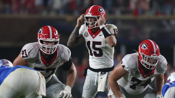 Nov 9, 2024; Oxford, Mississippi, USA; Georgia Bulldogs quarterback Carson Beck (15) gives direction before the snap during the second half against the Mississippi Rebels at Vaught-Hemingway Stadium. Mandatory Credit: Petre Thomas-Imagn Images Nov 9, 2024; Oxford, Mississippi, USA; Georgia Bulldogs quarterback Carson Beck (15) gives direction before the snap during the second half against the Mississippi Rebels at Vaught-Hemingway Stadium. Mandatory Credit: Petre Thomas-Imagn Images
