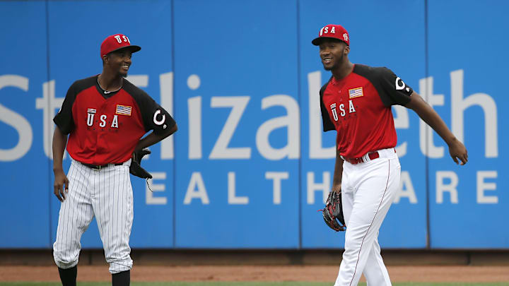 Cubs pitching prospect Carl Edwards Jr., left, and Reds pitching prospect Amir Garrett, catch fly balls during workouts ahead of the MLB- Futures Game, Sunday, July 12, 2015, at Great American Ball Park. Cubs pitching prospect Carl Edwards Jr., left, and Reds pitching prospect Amir Garrett, catch fly balls during workouts ahead of the MLB- Futures Game, Sunday, July 12, 2015, at Great American Ball Park.