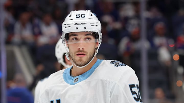 Oct 10, 2024; Elmont, New York, USA; Utah Hockey Club defenseman Sean Durzi (50) skates against the New York Islanders during the second period at UBS Arena. Mandatory Credit: Brad Penner-Imagn Images