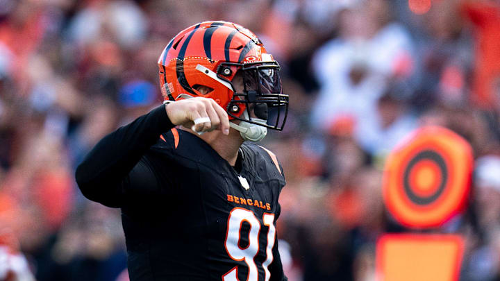Cincinnati Bengals defensive end Trey Hendrickson (91) reacts after pressuring Las Vegas Raiders quarterback Desmond Ridder (10) who threw an incomplete pass in the fourth quarter of the NFL game at Paycor Stadium in Cincinnati on Sunday, Nov. 3, 2024. Cincinnati Bengals defensive end Trey Hendrickson (91) reacts after pressuring Las Vegas Raiders quarterback Desmond Ridder (10) who threw an incomplete pass in the fourth quarter of the NFL game at Paycor Stadium in Cincinnati on Sunday, Nov. 3, 2024.
