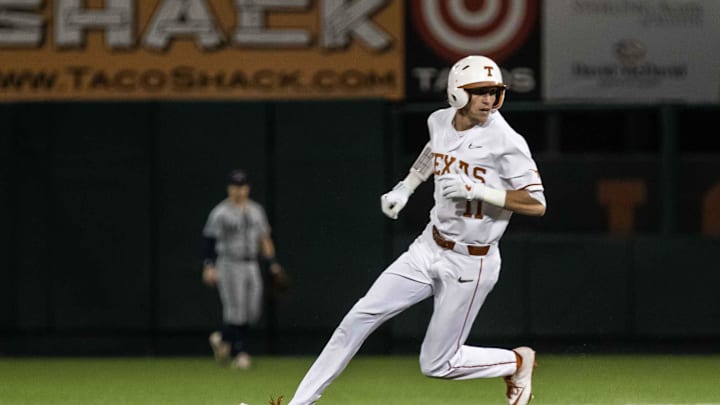 The Texas Longhorns' Duke Ellis reaches second base during a game against UTSA in 2020 in Austin.