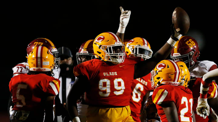 Clarke Central's Jaylon Stone (99) celebrates after recovering a fumble during a GHSA high school football game between Jackson and Clarke Central in Athens, Ga., on Friday, Nov. 12, 2021.